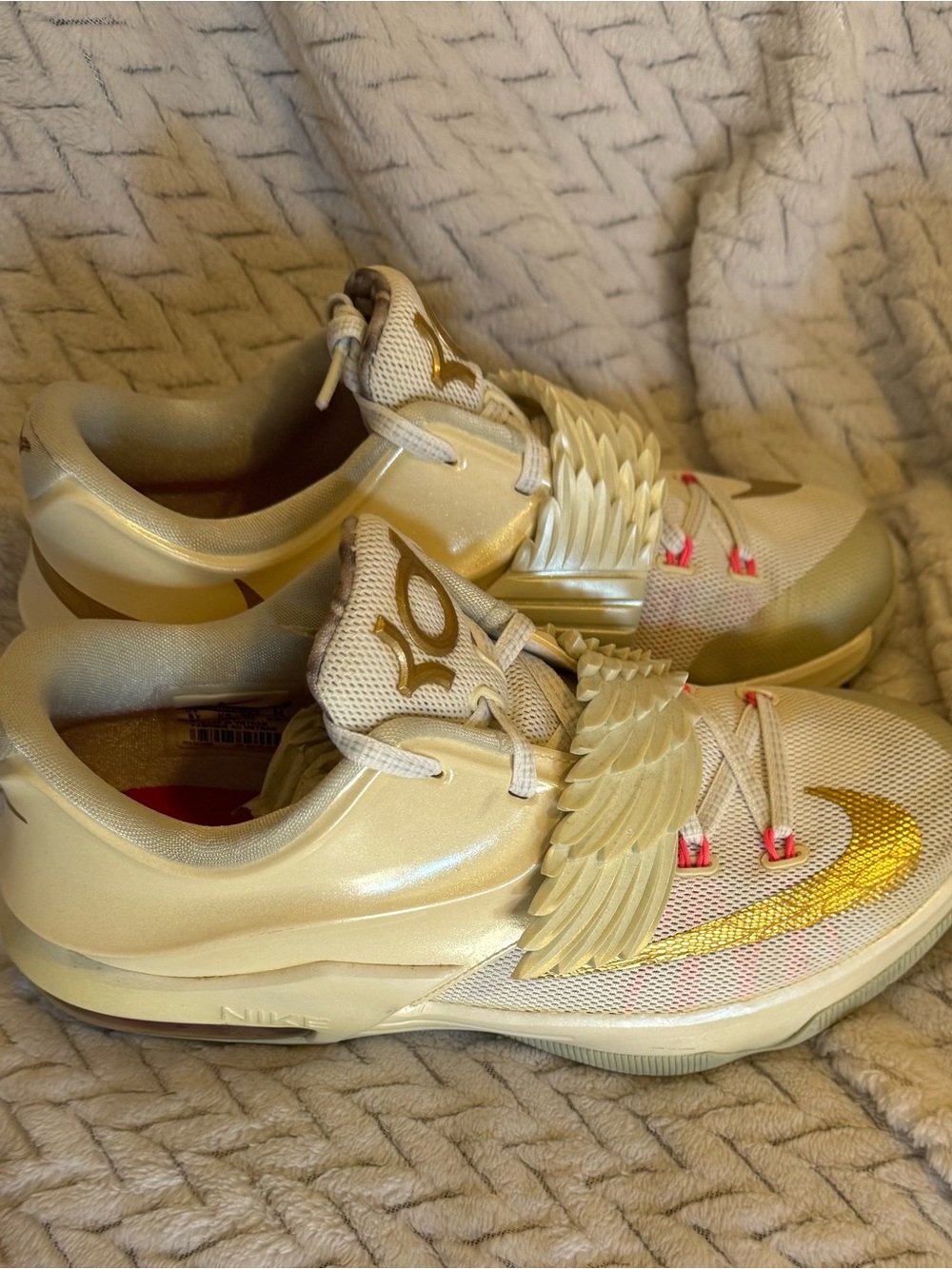 Nike Kids Gold Metallic Sneakers with Wing Detail